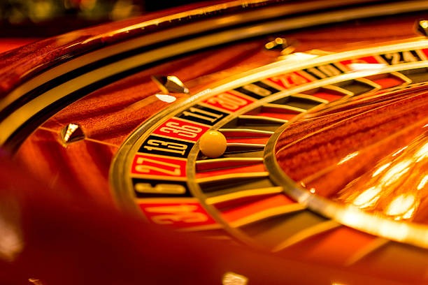 Joker Gaming slot interface on armyslot mobile app showing spin button and balance display